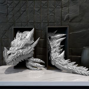 Silver Dragon emerging out of a black book nook box
