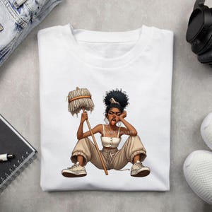 May include: White t-shirt featuring a cartoon illustration of a woman sitting with a mop, sticking her tongue out. She wears a white crop top, beige pants, and sneakers. The image has the text "CLIPARTGALLERY".