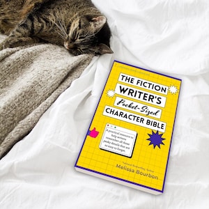 May include: A yellow book with the title "The Fiction Writer's Pocket-Sized Character Bible" by Melissa Bourbon. The book cover features a blue star, a thumbs up icon, and a computer screen with text.