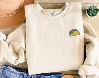 Embroidered taco sweatshirt in a cozy unisex fit with a cute simple design
