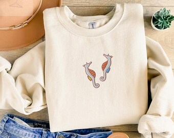 Embroidered seahorse sweatshirt in a cozy unisex fit with a cute simple design