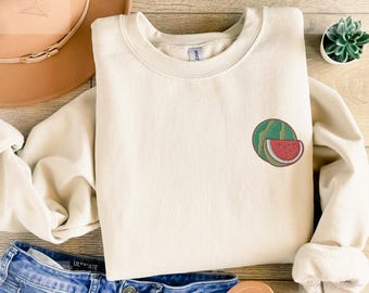 Embroidered watermelon sweater in a cozy unisex fit with a simple clean design