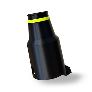 May include: Black bottle-shaped object with a bright yellow band near the top. The object has a smooth, matte finish and a small rectangular opening on the side. The object is angled slightly, casting a shadow on the white background.