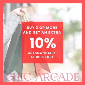 a person holding shopping bags, with a red and white advertisement for a shopping event.