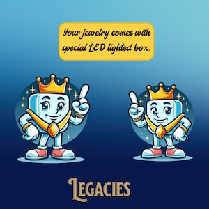 May include: A cartoon illustration of a blue box wearing a gold crown and a gold necklace. The box is smiling and pointing with its right hand. The text "LEGACIES" is below the box. The text "Your jewelry comes with special LED lighted box." is at the top of the image.
