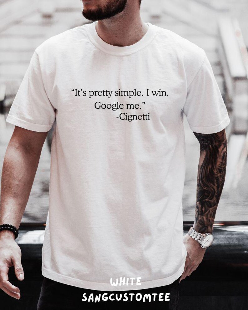 May include: White t-shirt with the quote "It's pretty simple. I win. Google me." attributed to Cignetti. The text is in black, centered on the chest. The brand name "SANGCUSTOMTEE" is printed at the bottom.
