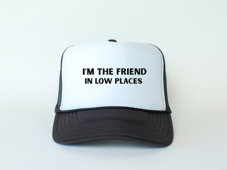 Funny country trucker hat with phrase I’m the Friend in Low Places, unisex adjustable mesh cap, western humor gift for men and women