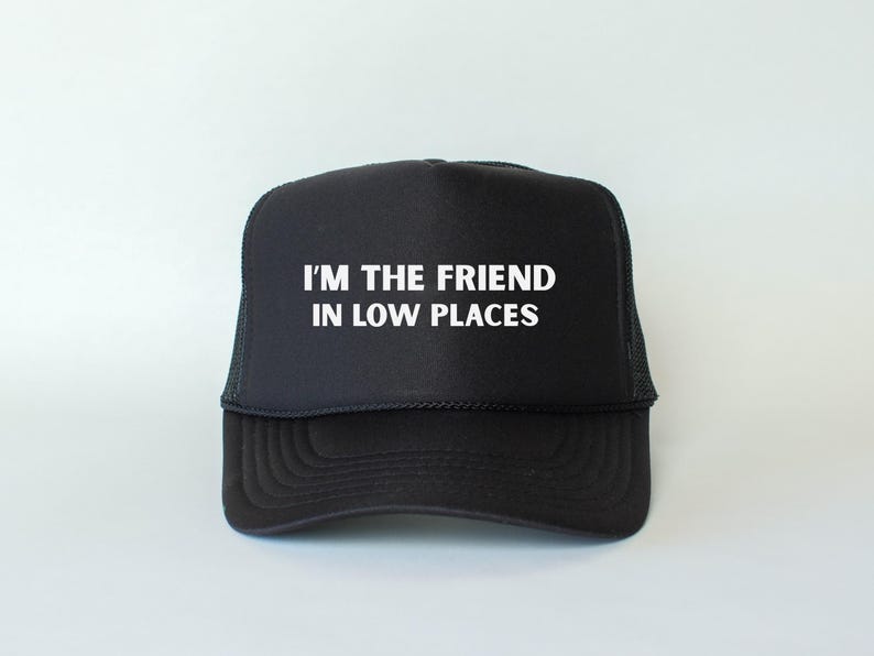 Funny country trucker hat with phrase I’m the Friend in Low Places, unisex adjustable mesh cap, western humor gift for men and women