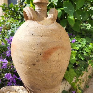 Old terracotta jar pot