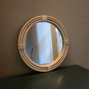 Vintage round rattan mirror from the 50s and 60s