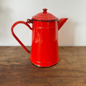 Vintage red enamel kettle
