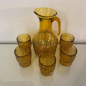Vintage amber glass service carafe and glasses