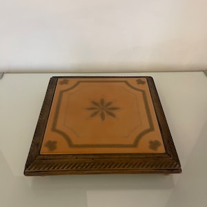 Antique wooden ceramic trivet