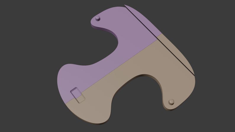 Puede incluir: Un pl&aacute;stico de dos tonos, beige y morado, con forma de T con un recorte en el medio.