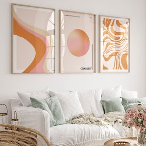 May include: Three abstract art prints with a gradient colour scheme. The prints feature a curved line, a circle, and a swirling pattern. The text on the prints reads "CONJUNCTION OF COLORS" and "GRADIENT".
