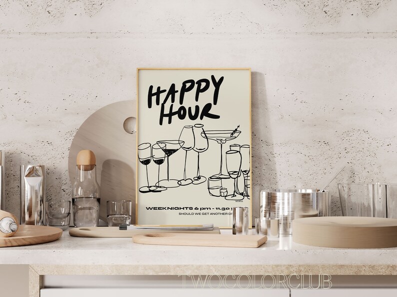 May include: A black and white illustration of glasses on a beige background with the text "HAPPY HOUR" in black. The text below the illustration reads "WEEK NIGHTS 6 pm - 11:30 pm" and "SHOULD WE GET ANOTHER DRINK?" in black. The poster is framed in a light wood frame.
