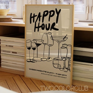 May include: A framed print with the text "HAPPY HOUR" in black script. The print features a black and white illustration of various glasses, including martini glasses, wine glasses, and champagne flutes. The text "WEEKNIGHTS 6 pm - 11.30 pm" and "SHOULD WE GET ANOTHER DRINK?" is printed below the illustration. The text "TWOCOLORCLUB" is printed at the bottom of the print.