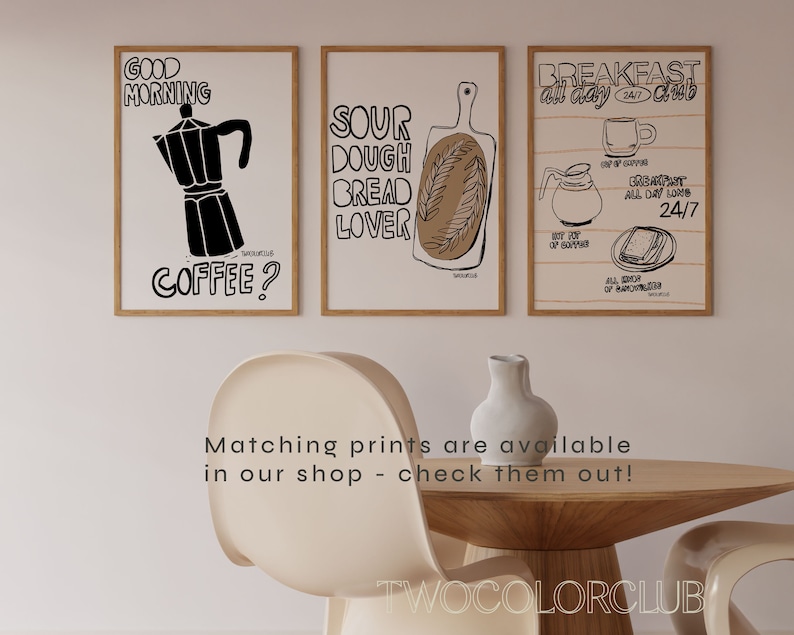 May include: Three black and white illustrations on white paper with wooden frames. The first illustration is a coffee pot with the text "Good Morning Coffee?" The second illustration is a loaf of bread with the text "Sour Dough Bread Lover." The third illustration is a cup of coffee, a pot of coffee, and a sandwich with the text "Breakfast All Day Club 24/7".