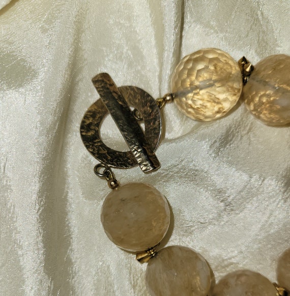 Faceted yellow quartz and gold-tone bead bracelet. - image 2