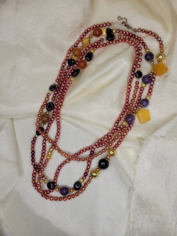 Kol Naylor beaded lanyard necklace.