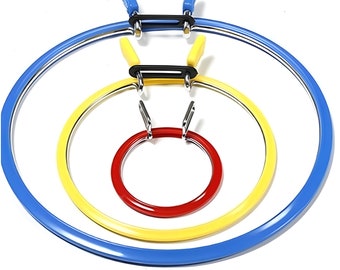 May include: Three embroidery hoops, nested inside each other. The largest hoop is blue, the middle hoop is yellow, and the smallest hoop is red.
