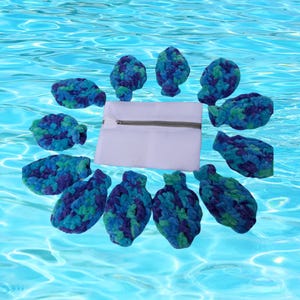 May include: A set of blue, green, and purple crocheted water balloons surrounding a white mesh laundry bag with a zip. The water balloons are made of soft, textured yarn, ideal for outdoor water games.