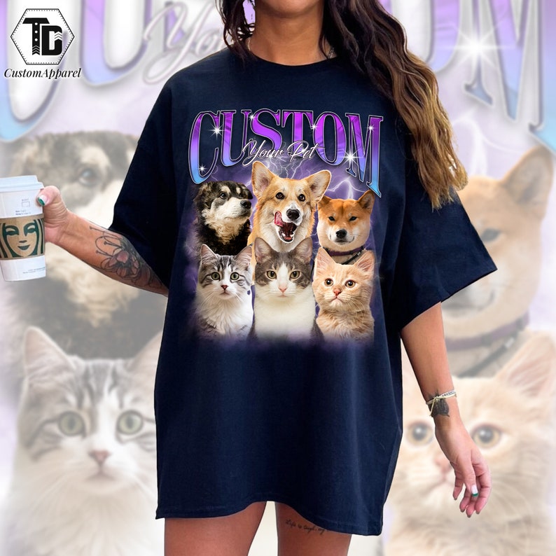 May include: Black t-shirt with a graphic of a group of cats and dogs. The graphic is in a retro style with a purple and blue gradient. The text "CUSTOM Your Pet" is above the graphic.