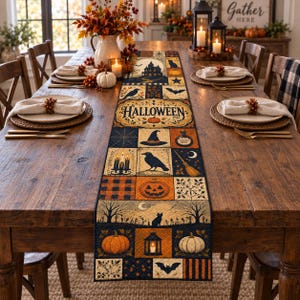 May include: A rectangular quilted table runner featuring a patchwork design with Halloween motifs including a haunted house, pumpkins, a witch hat, a black cat, a crow, and the text "HALLOWEEN" in a central decorative frame with orange and black colors.