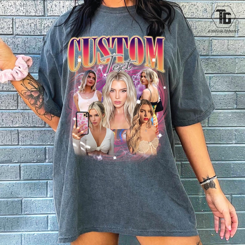 May include: Gray t-shirt with a custom design featuring the word "CUSTOM" in a gradient font. The design includes multiple images of a woman. The shirt has a vintage, washed look.