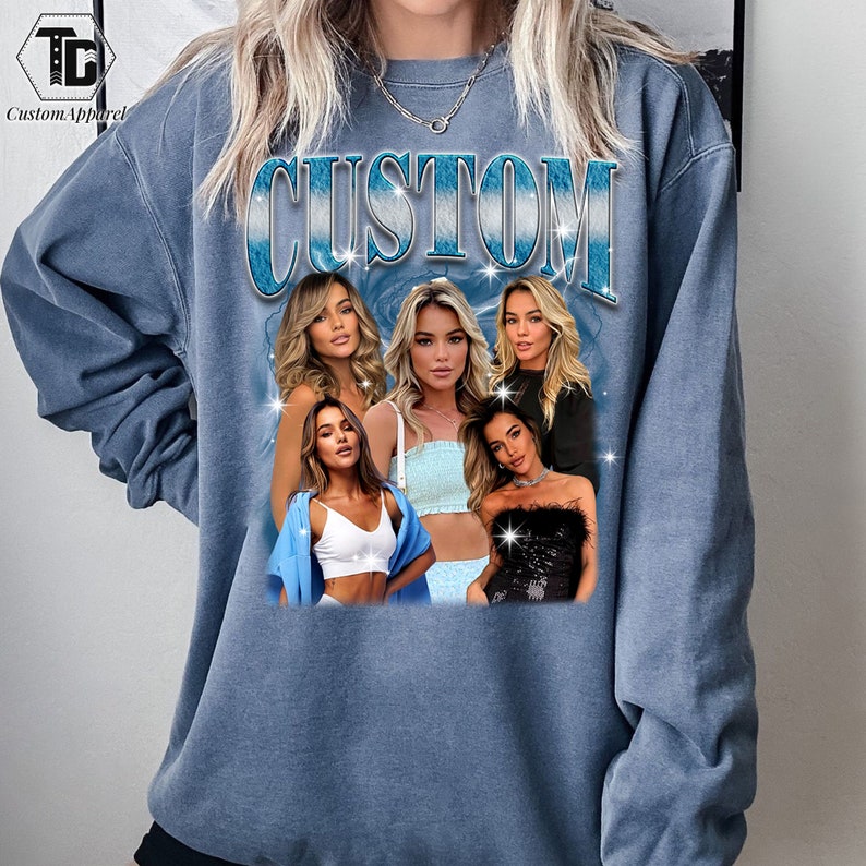 May include: A blue sweatshirt with the word "CUSTOM" printed in a blue and white gradient. The sweatshirt features a collage of five women with different hairstyles and clothing.
