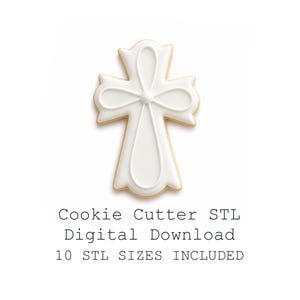 Pode incluir: Um biscoito branco em forma de cruz com um desenho de laço, contornado com glacê branco e sobre um fundo branco. O biscoito tem uma borda marrom dourada. O texto na imagem diz: Cookie Cutter STL Digital Download 10 STL SIZES INCLUDED.