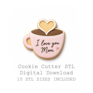 May include: A pink cookie shaped like a coffee cup with the words "I love you Mom" written on it. A heart-shaped cookie sits atop the cup. The image also includes the text "Cookie Cutter STL Digital Download 10 STL Sizes Included."