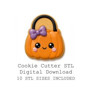 May include: A pumpkin-shaped biscuit with orange icing, a black handle, and a purple bow. The biscuit features a smiling face with black eyes and pink cheeks. Text below reads: Cookie Cutter STL Digital Download 10 STL SIZES INCLUDED.