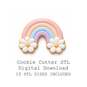 Puede incluir: Una galleta en forma de arcoíris con franjas de glaseado en tonos pastel rosa, melocotón, azul y morado, con una margarita blanca de centro amarillo en cada extremo. El texto dice: Cookie Cutter STL Digital Download, 10 STL SIZES INCLUDED.
