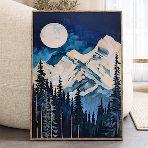 May include: A framed landscape painting depicts a mountain range under a full moon. The artwork features a palette of blues, whites, and beige, with stylized trees in the foreground. The painting is in a wooden frame.