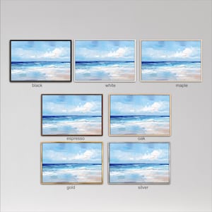 six framed artworks depicting various landscapes, including a beach scene, ocean, and sky. The artworks are labeled with different colors and frame styles, such as black, white, maple, espresso, oak, and gold.