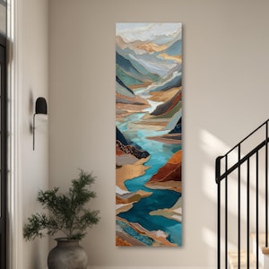 May include: A tall, vertical rectangular canvas painting depicting an abstract landscape with a winding river flowing through mountains. The artwork features layered textures in shades of teal, deep blue, copper, gold, and white, creating a sense of depth.