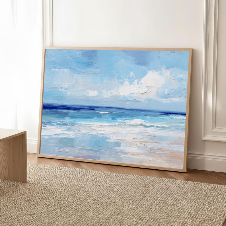 a large painting of a serene ocean scene with a blue sky and white clouds.