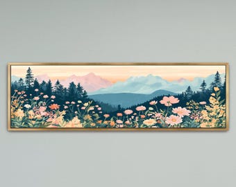 May include: A panoramic landscape wall art print in a thin gold frame featuring a foreground of pink, yellow, and white wildflowers. The midground shows a dense dark green forest of pine trees, and the background displays light blue mountains.
