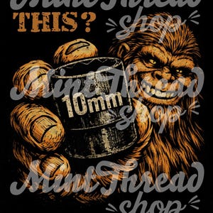 Puede incluir: Gráfico con una criatura parecida a Bigfoot sosteniendo un vaso de 10 mm. El texto dice "LOOKING FOR THIS?" y "Mint Thread shop" en una fuente desgastada, sobre un fondo negro. La criatura es marrón y naranja.