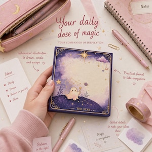 May include: A square notepad featuring a purple and cream celestial illustration of a small ghost holding a star on a hill under a night sky with the text THE STAR. The notepad is surrounded by a pink pencil case, a spiral notebook, pens, and tape.
