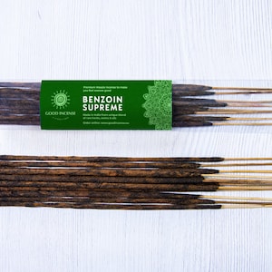 May include: A package of brown incense sticks with a green label that reads "Good Incense" and "Benzoin Supreme". The label also includes a mandala design and a sun graphic.