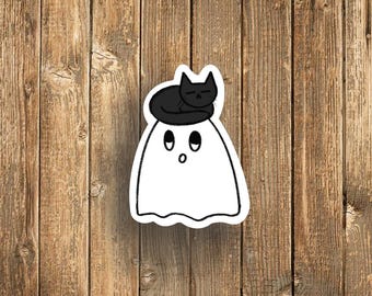 vinyl ghost with a cat on its head sticker