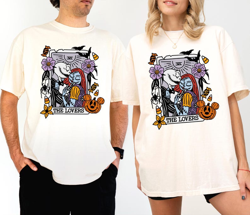 two people wearing white t-shirts with a graphic design depicting characters from the movie "The Nightmare Before Christmas".