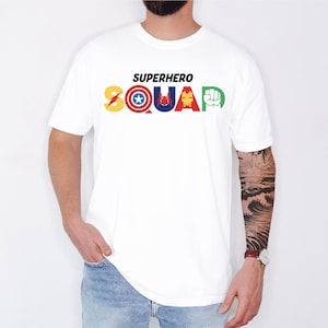 a man wearing a white tshirt with the word squadron printed on it