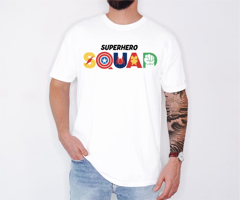 a man wearing a white tshirt with the word squadron printed on it