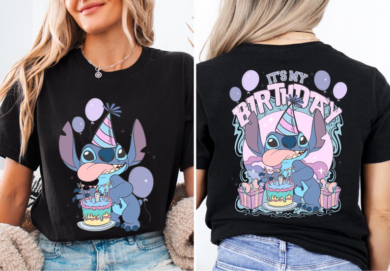 a woman wearing a black shirt with a cartoon character on it