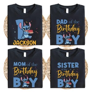 May include: Four black t-shirts with a blue Stitch character holding a birthday cake. The shirts say "DAD of the Birthday Boy", "MOM of the Birthday Boy", "SISTER of the Birthday Boy", and "JACKSON" with the number "1" and a star.