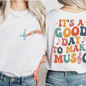 two women wearing t - shirts that say it's a good day to make