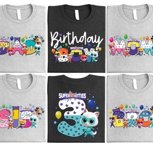 a group of t - shirts with cartoon characters on them
